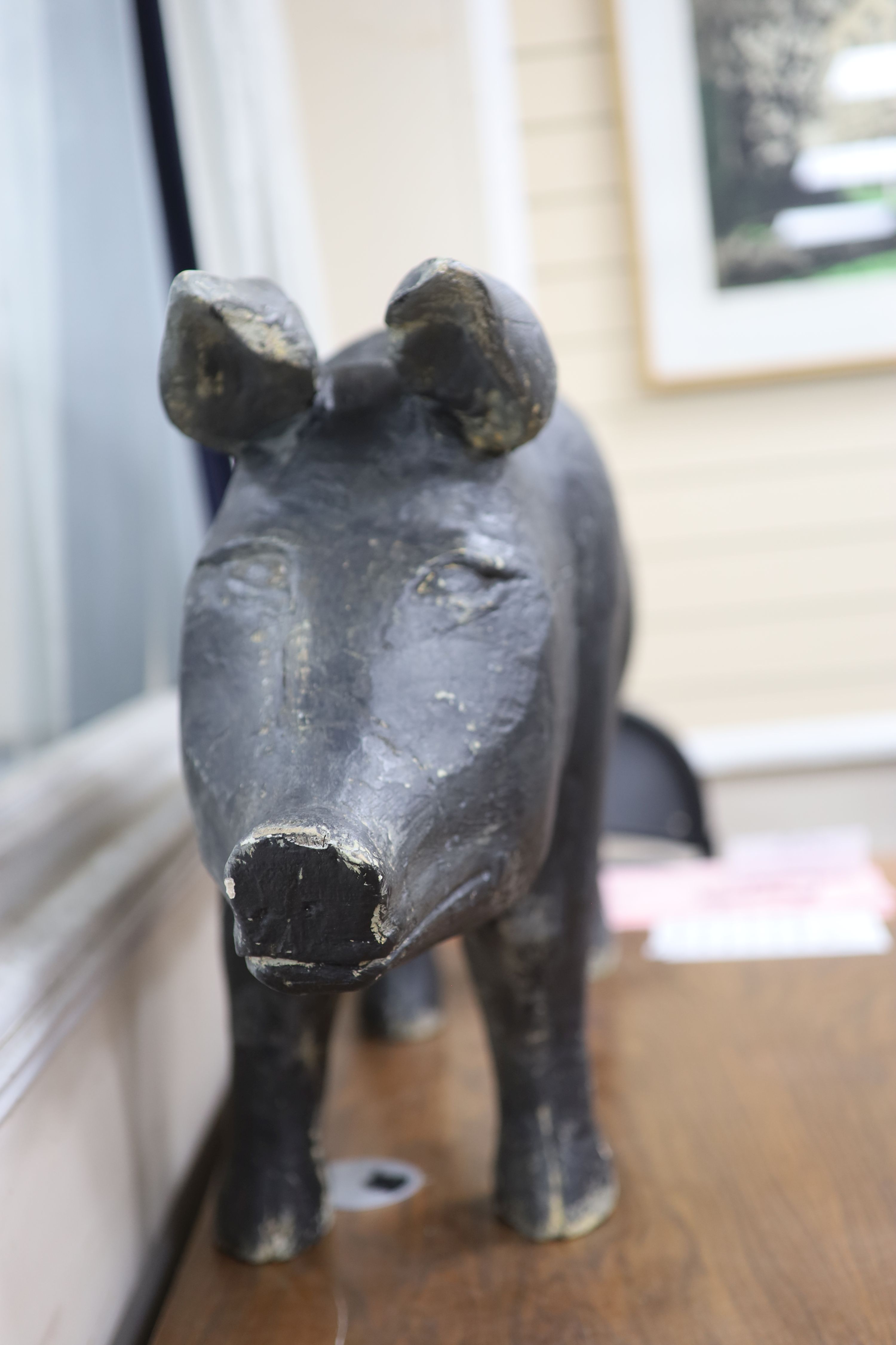 A vintage painted carved wood model of a standing pig, length 120cm